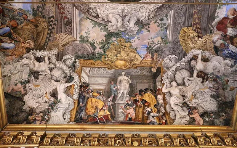 Part of the painted vault over the Great Hall, crowded with figures and ships from the battle of Lepanto